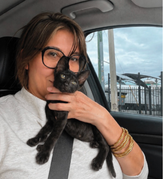 Founder Karina Korenblum holding a rescue kitten